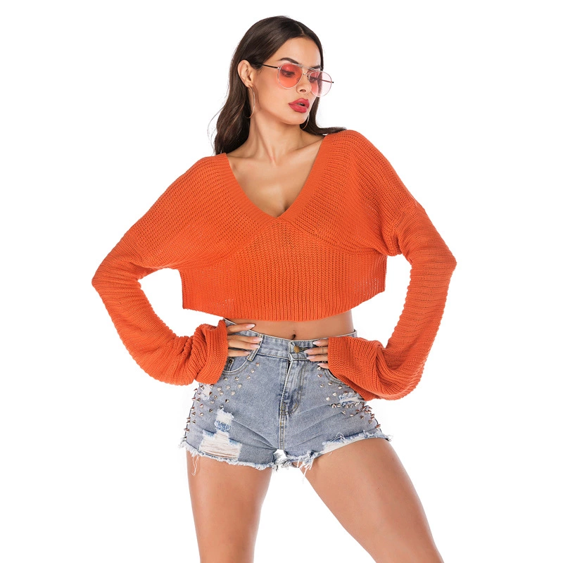 Short section exposed navel sweater women's autumn and winter loose lazy solid color sweater coat